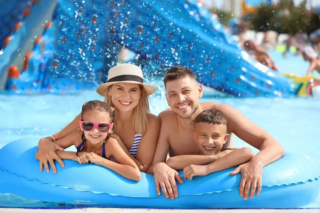 Guests in a heated outdoor pool at Westgate Vacation Villas